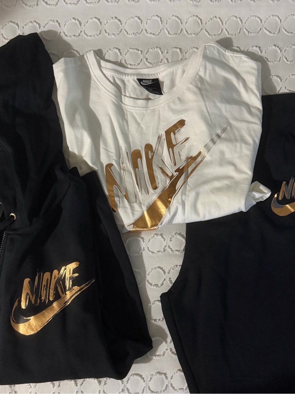 Nike Women’s Black Jogging Set and White T-Shirt with Gold Logo